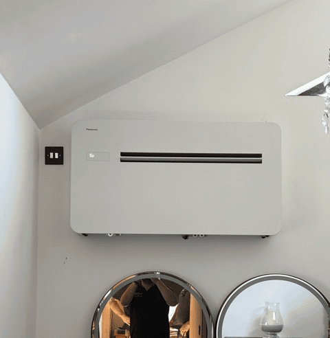 panasonic rac solo air con mounted on a wall